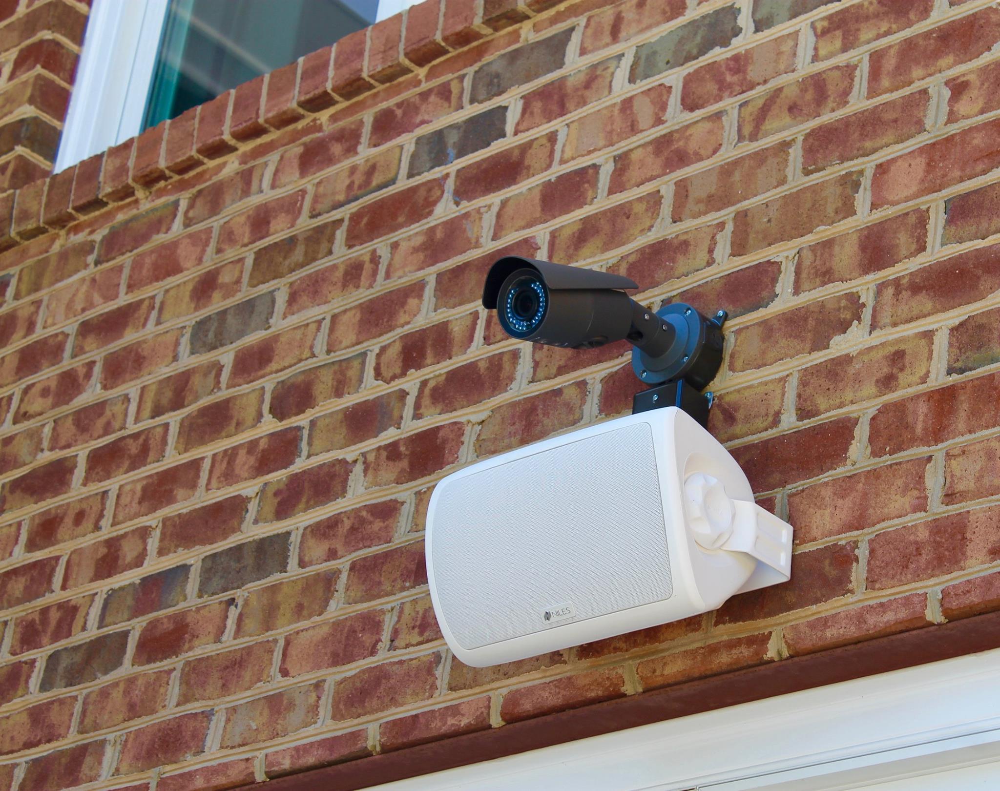 Niles outdoor speaker and Luma Surveillance Bullet IP Outdoor Camera
