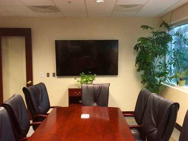 Wall Mounted TV in Conference Room