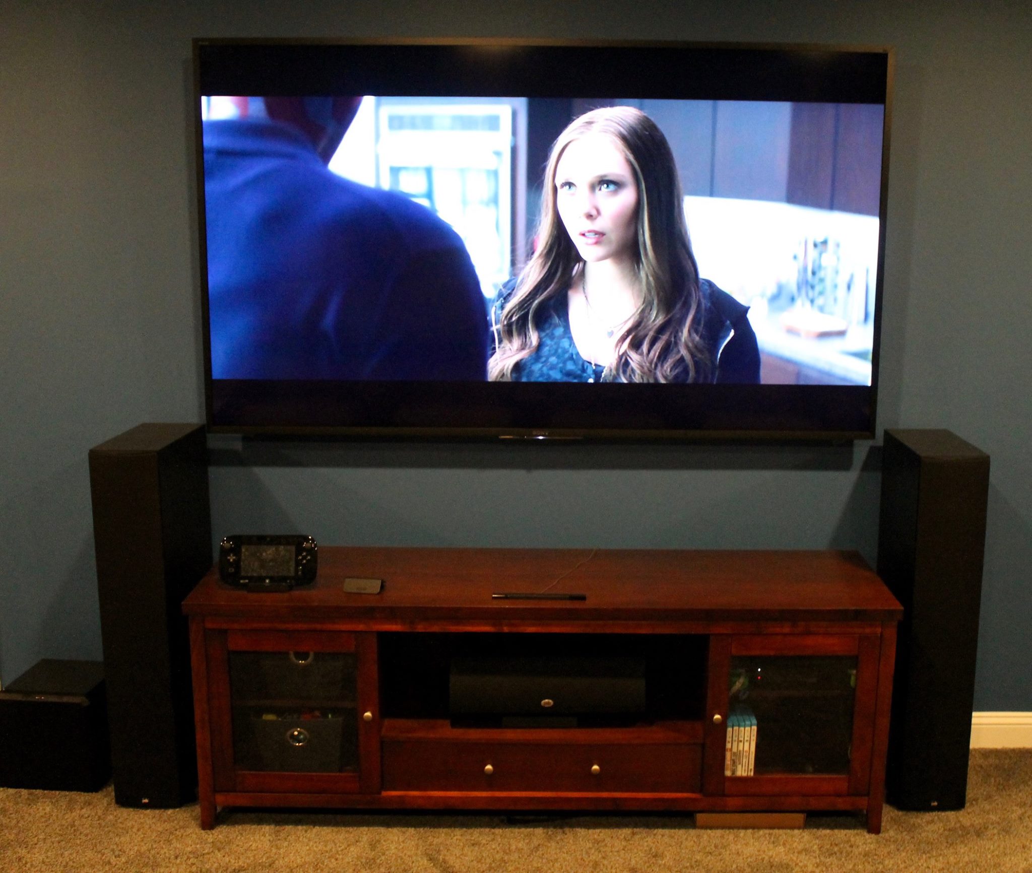 Wall Mounted TV with Floor Speakers