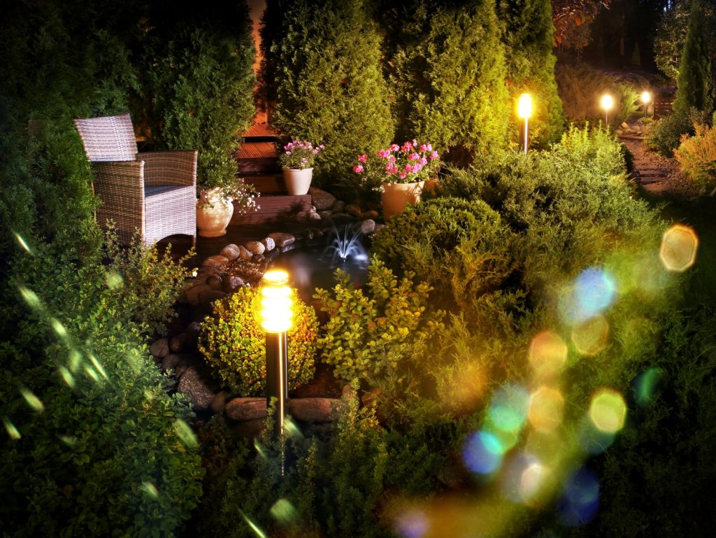 A garden benefits form an outdoor lighting installation.